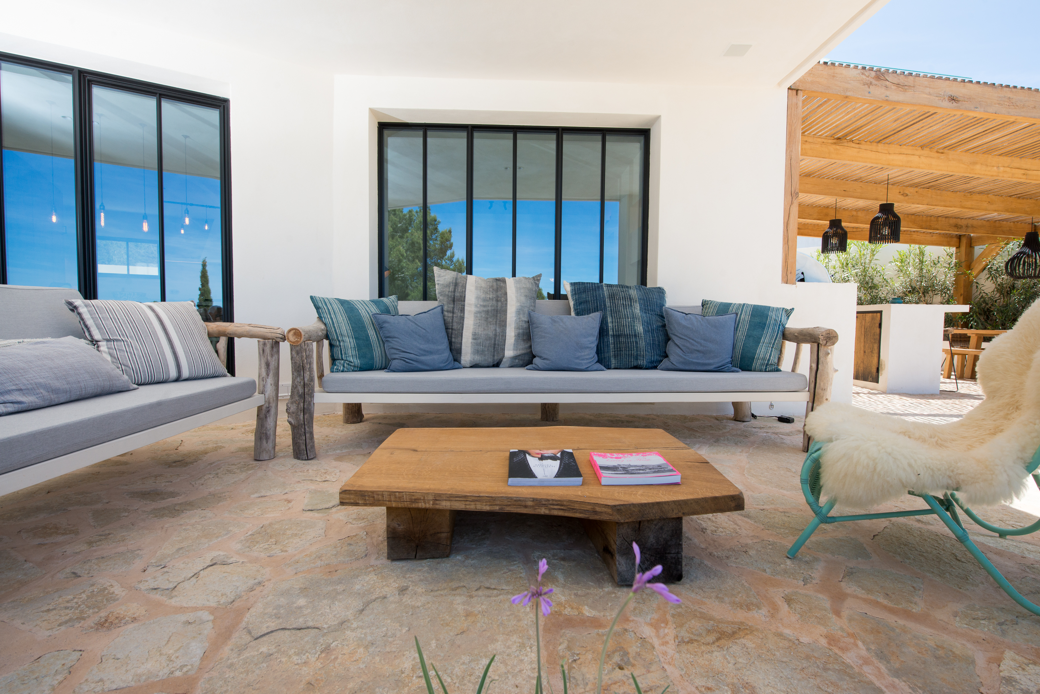 Resa estates ibiza luxury home for sale cala tarida tourise license sofa outdoor.jpg